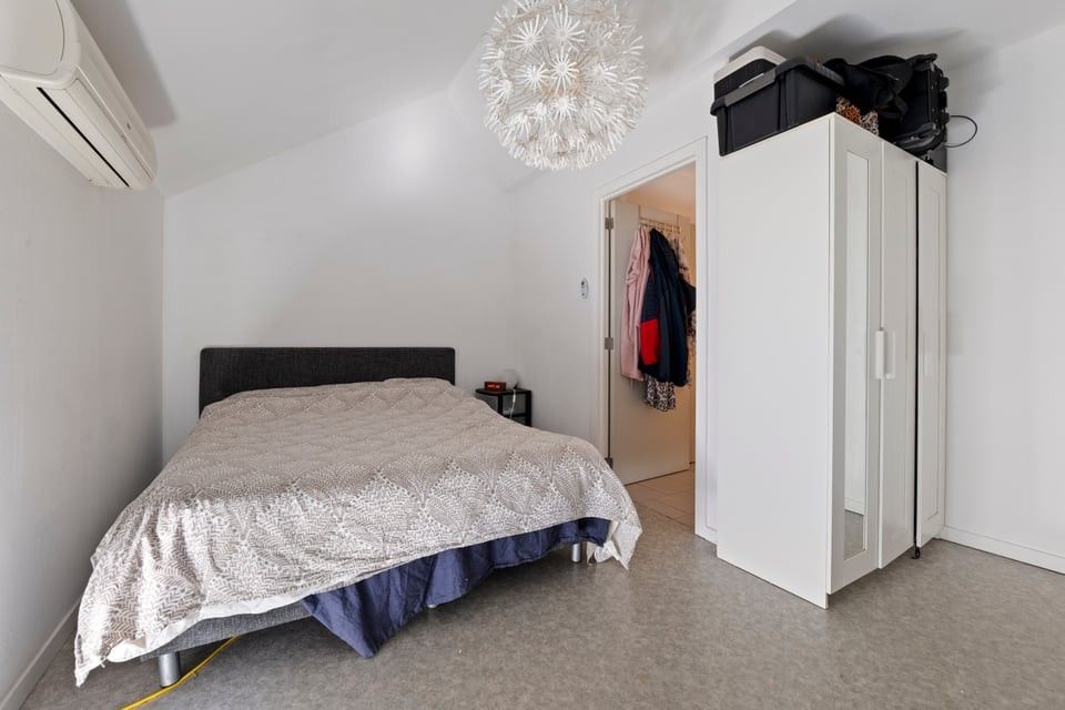 KNAP HANDELSPAND MET TWEE APART VERHUURDE APPARTEMENTEN IN HET CENTRUM VAN SINT-TRUIDEN foto 29