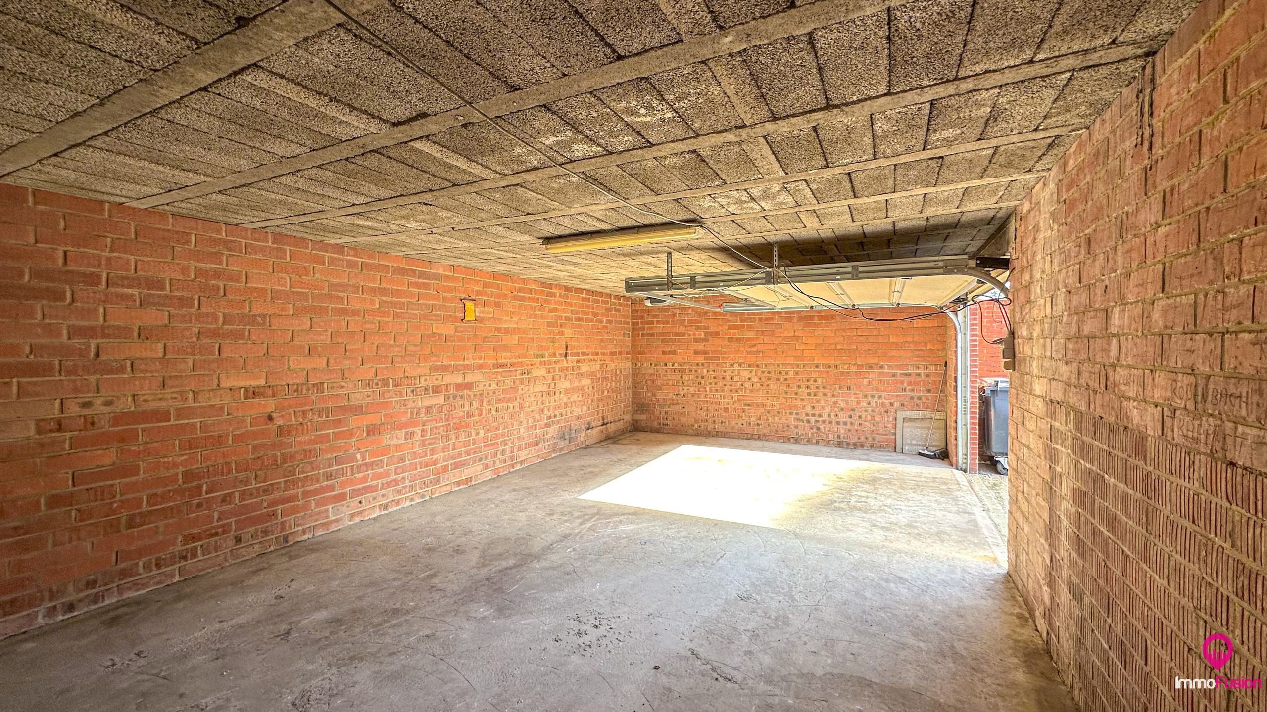 Ruim handelspand met garage in het centrum van Beringen! foto 19