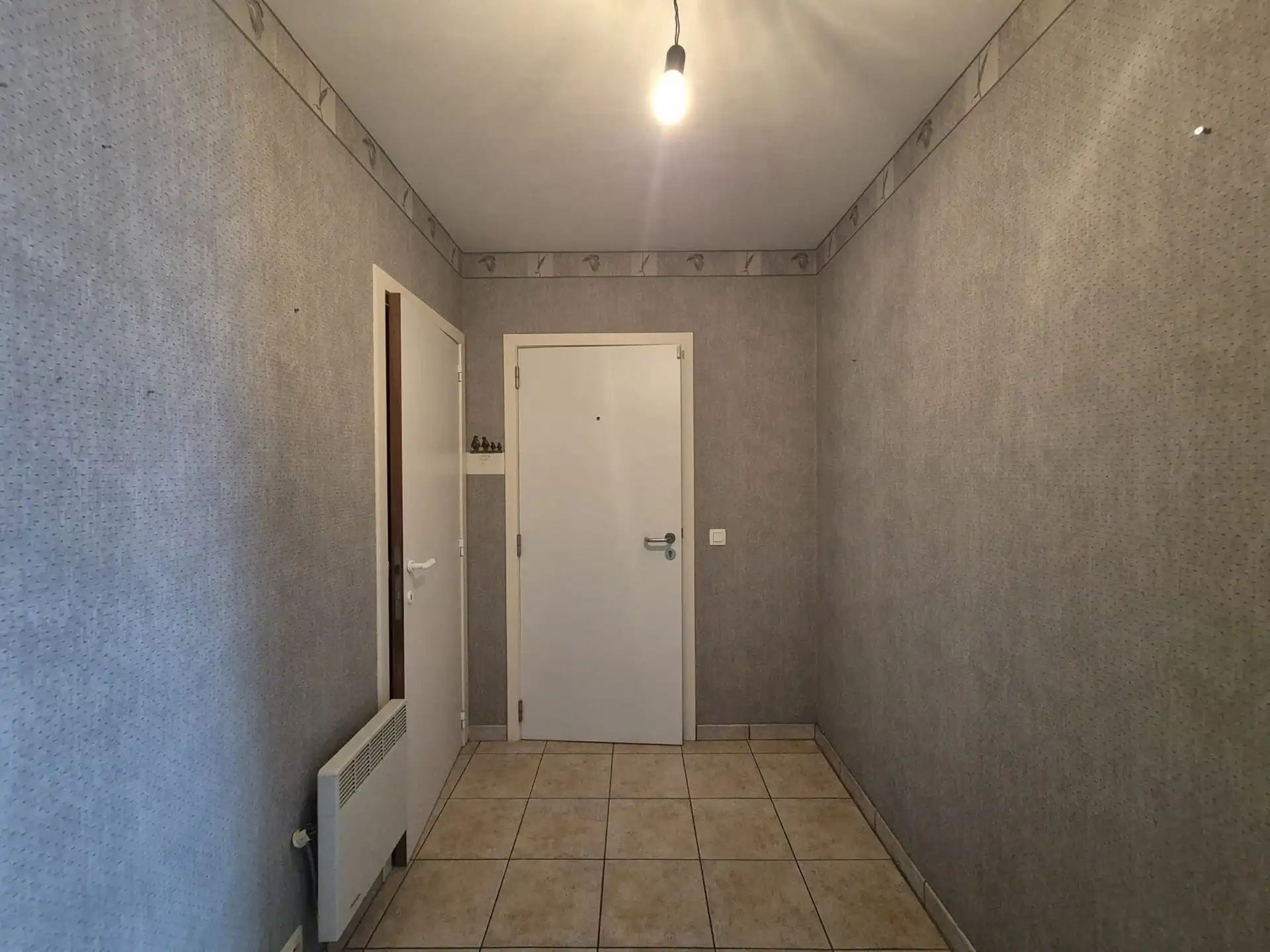 Ruim appartement met garage gelegen op het eerste verdiep vlakbij de Warande. foto 2