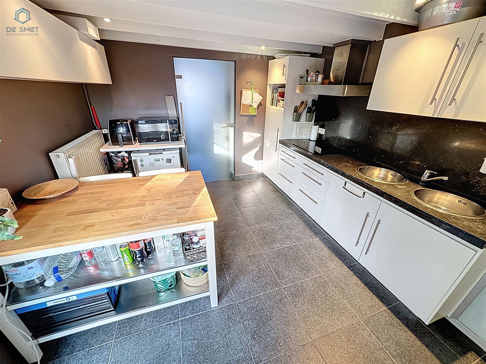 Instapklare woning met 2 slaapkamers, terras, carport en berging in Ophasselt foto 5