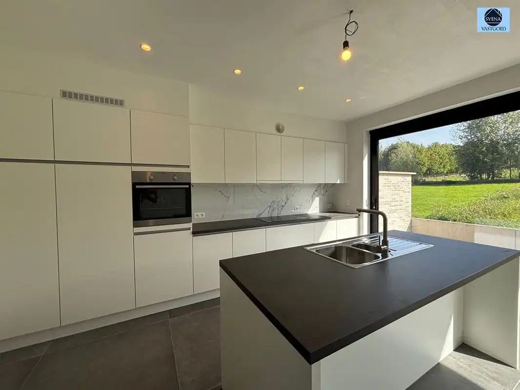 BEN-WONING MET ZONNIGE TUIN IN ONKERZELE foto 3