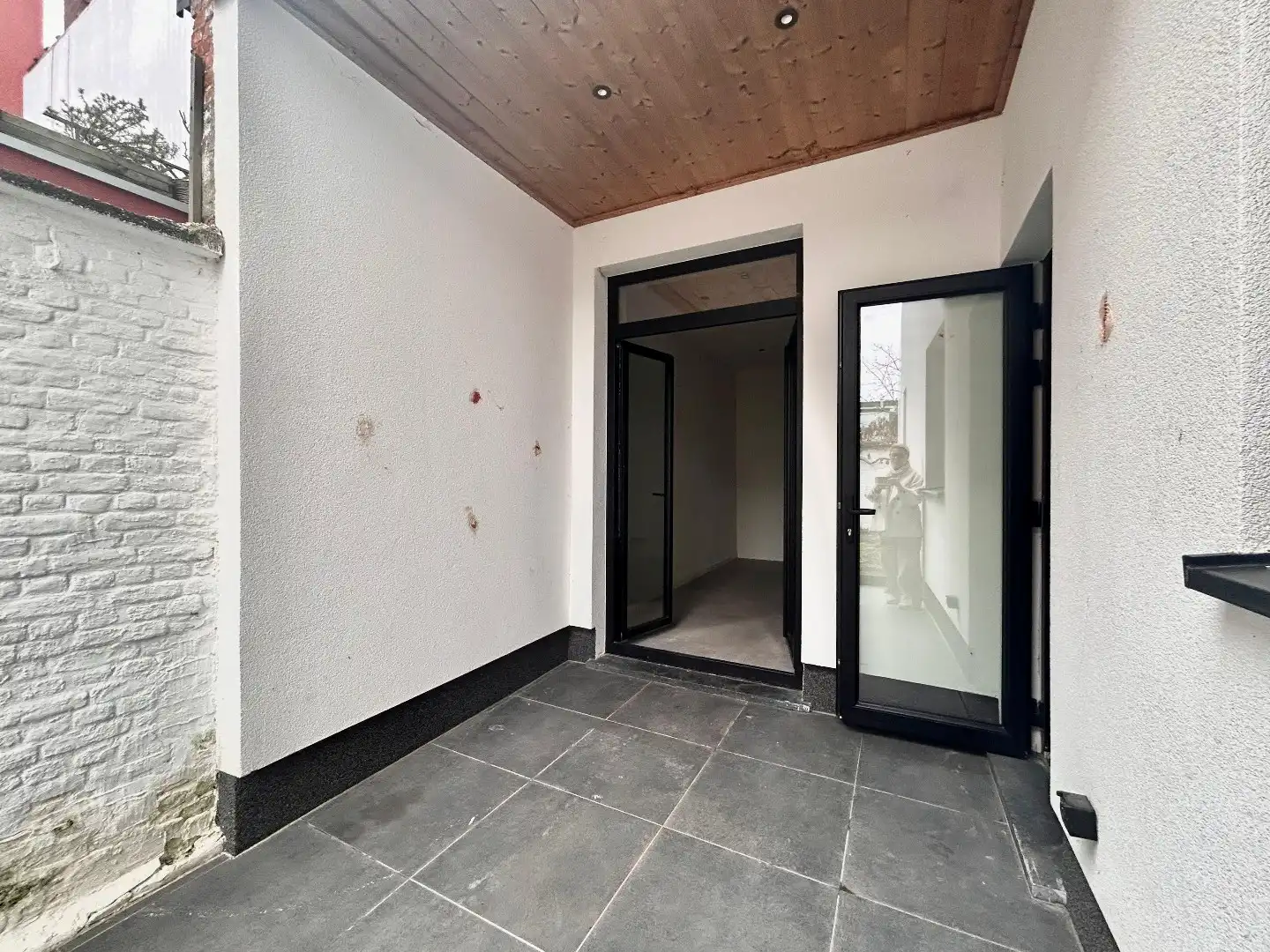 Gezellig gelijkvloers 2-slpk app met tuin. foto 14