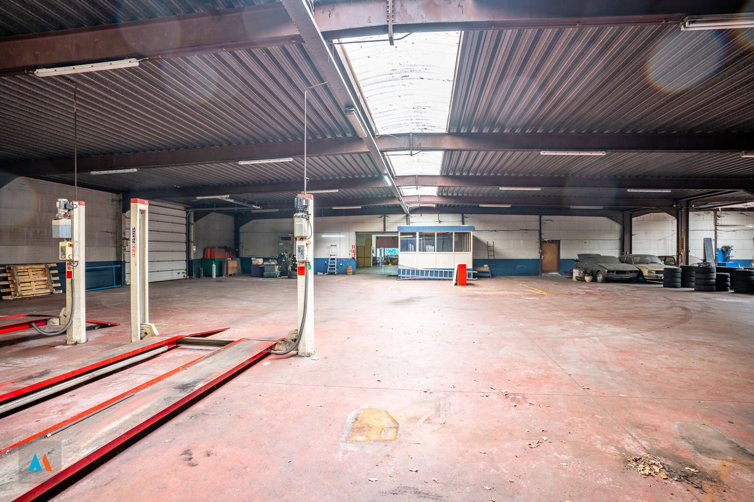 Garagebedrijf met woonst foto 14