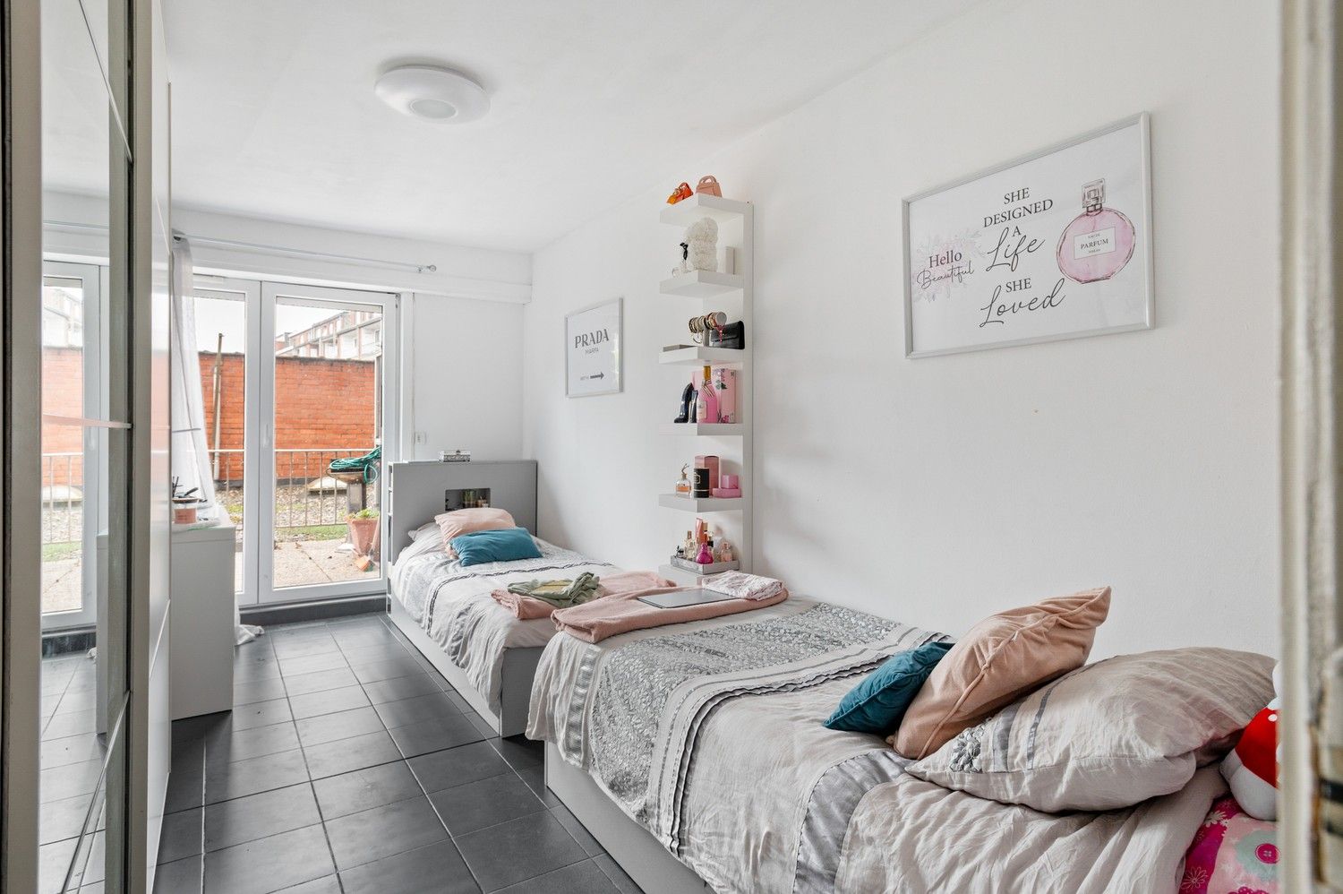Ruim gelijkvloers appartement met 3 slaapkamers en terras in Deurne! foto 9