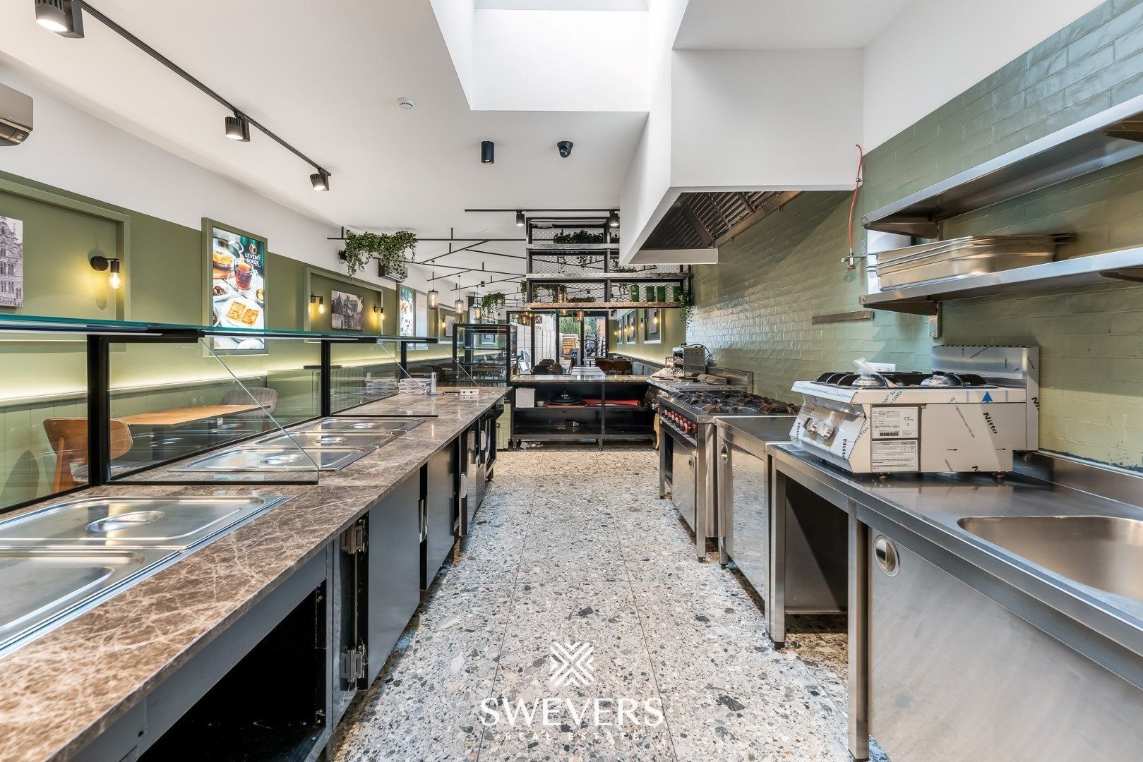 Modern handelspand met woonst in Heusden-centrum foto 7