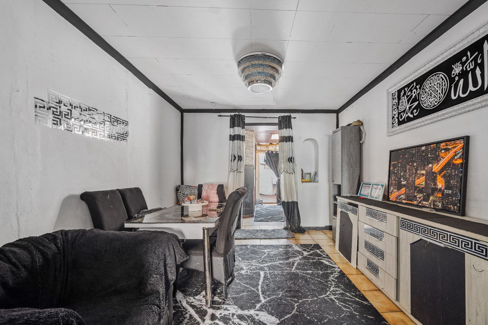 Te renoveren rijwoning met potentieel in de buitenrand van Tienen foto 7
