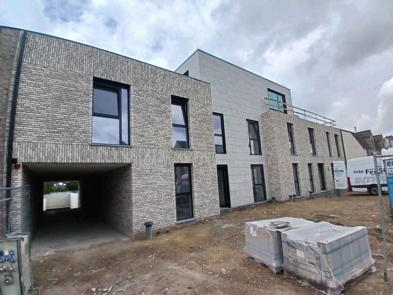 Gelijkvloers nieuwbouw appartement met terras en tuin gelegen in het centrum van Opglabbeek foto 21