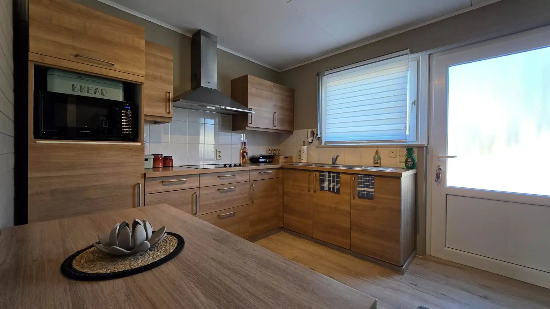 GELIJKVLOERSE WONING MET 1 SLPK TE TREMELO foto 2