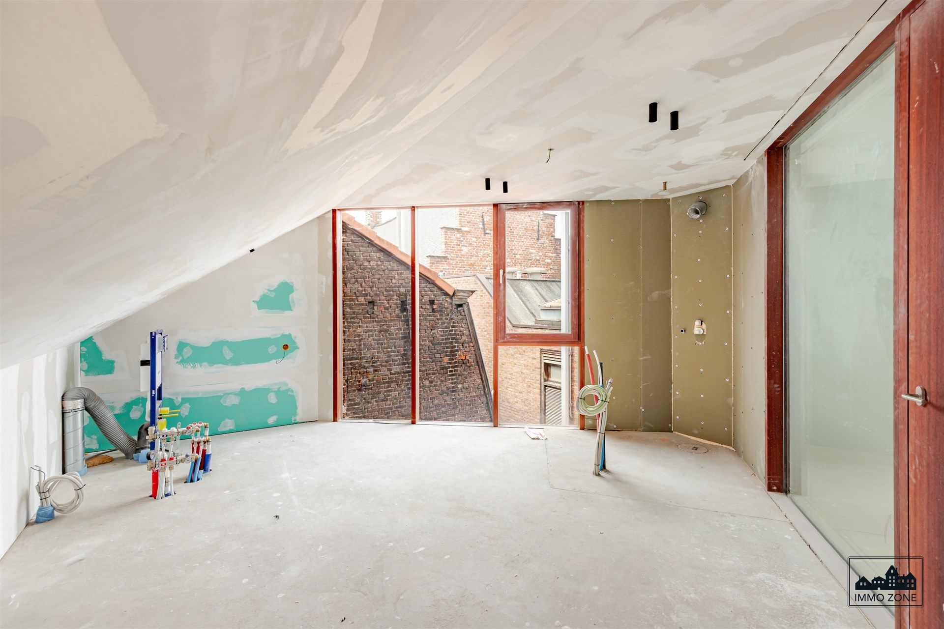 Architecturale parel tussen Vlas-en Vrijdagsmarkt foto 7