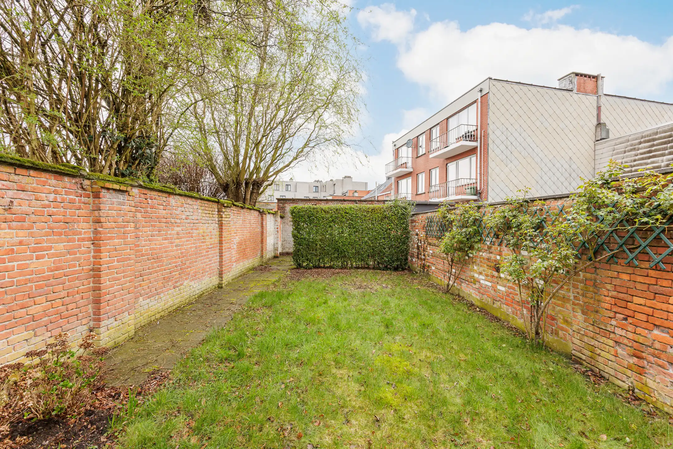 Instapklare  woning met drie slaapkamers en stadstuintje foto 30