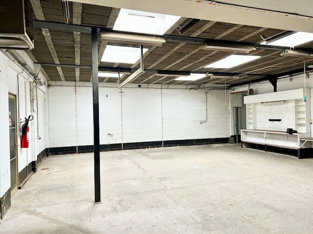 MULTIFUNCTIONEEL PAND MET DUPLEXAPPARTEMENT EN GARAGE foto 2
