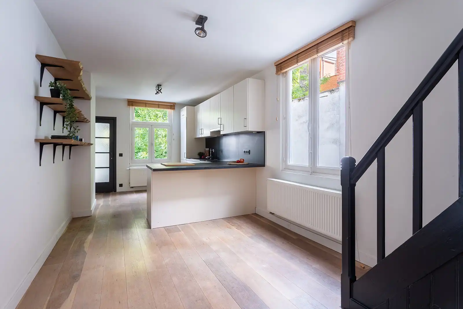 Duplex met terras in bruisende buurt foto 13