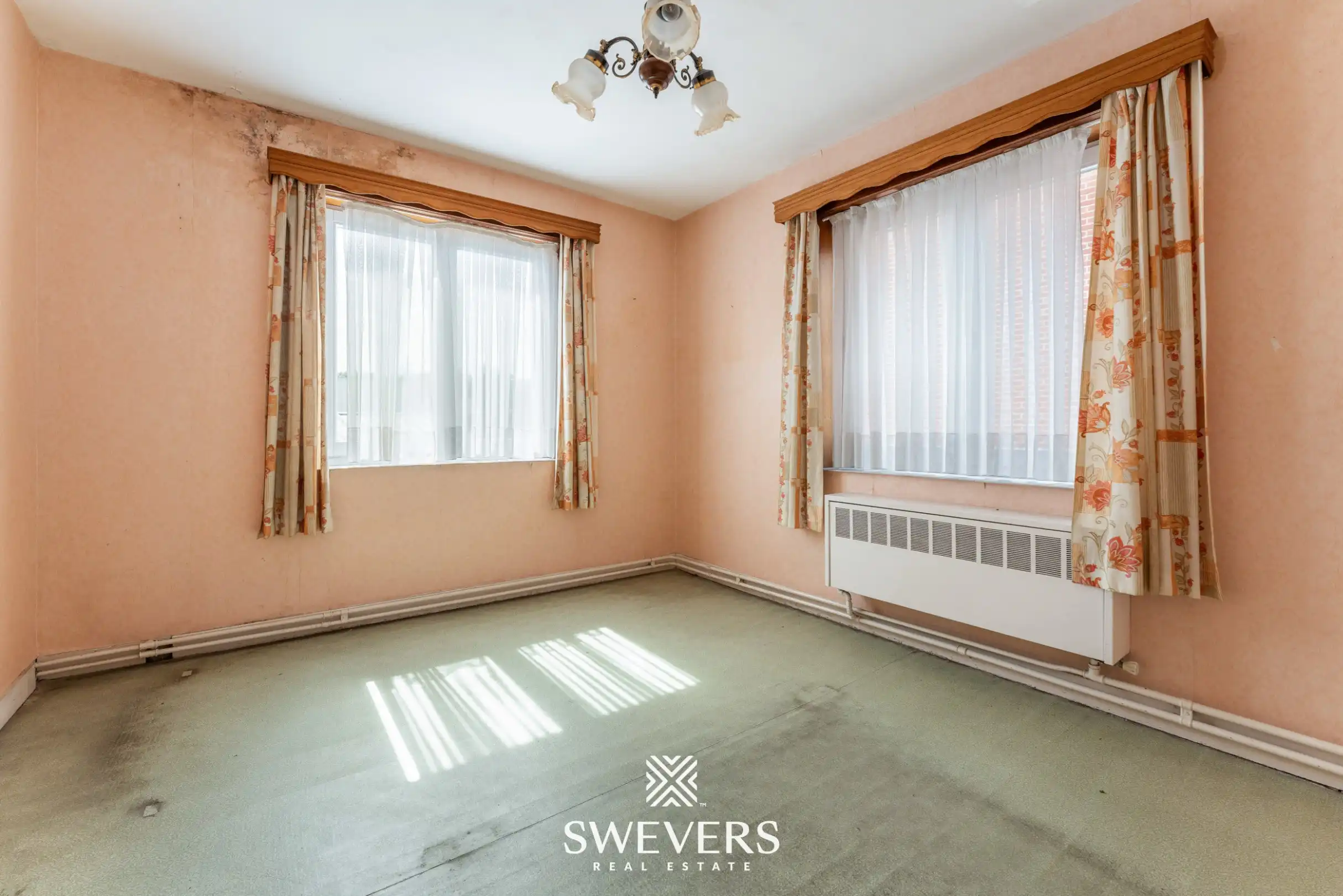 Karaktervolle woning met renovatiepotentieel op rustige ligging foto 17
