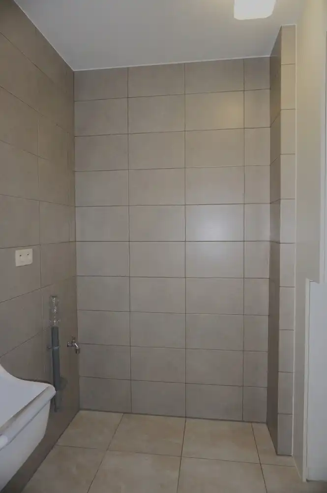 Ruim appartement van 110 m² met 2 slaapkamers, lift, 2 autostaanplaatsen en twee terrassen in het centrum van Paal foto 11