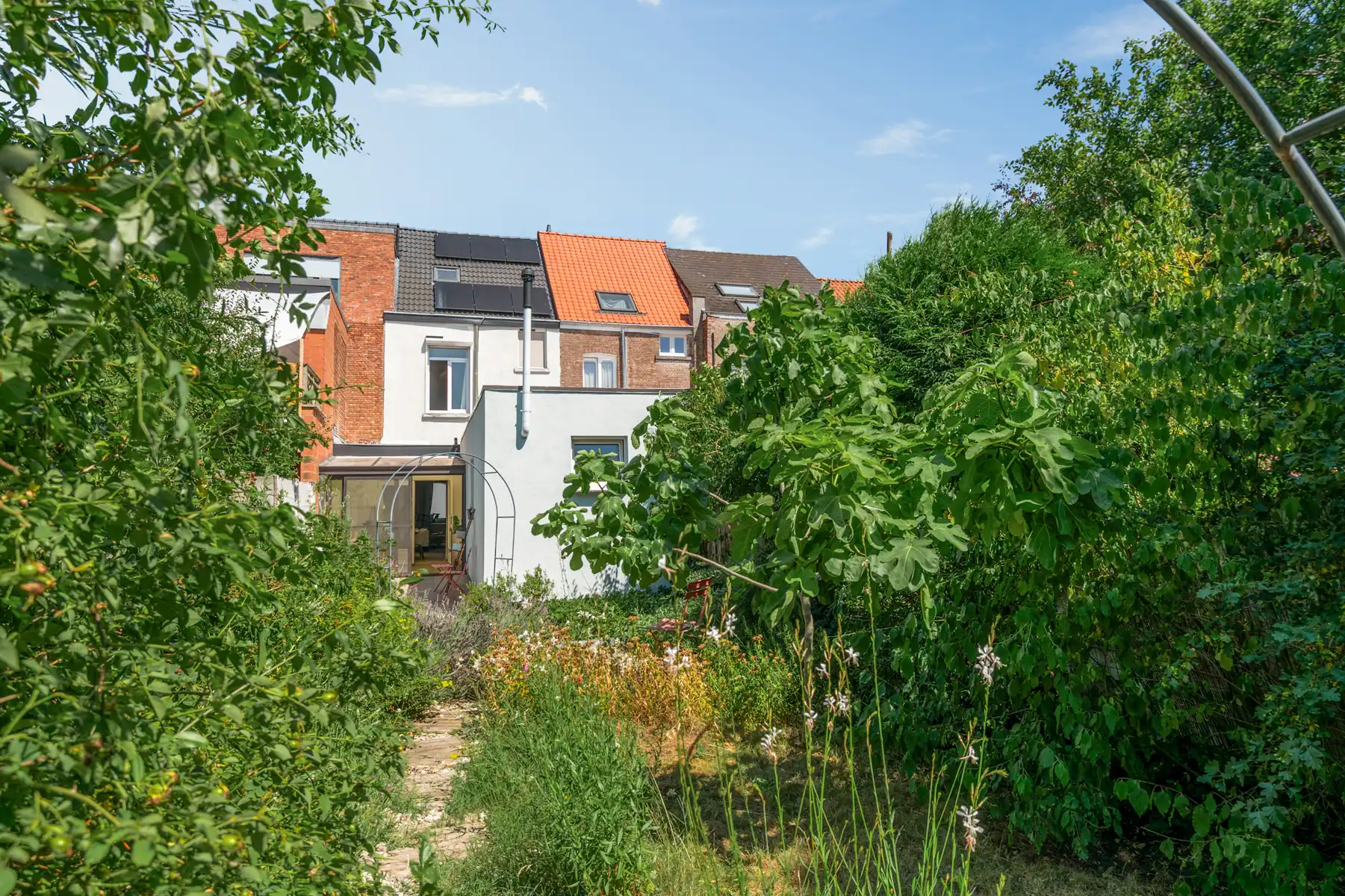 Prachtige ééngezinswoning met 4 SLK en gezellige stadstuin foto 8