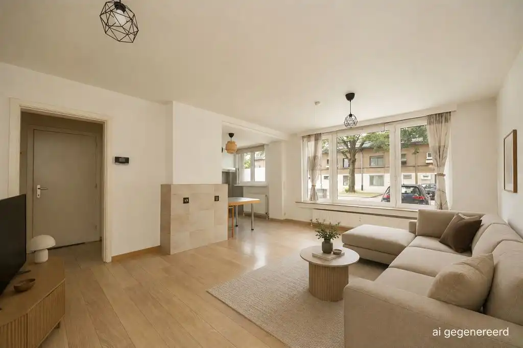 Instapklaar gelijkvloers appartement met gezellige koer foto {{pictureIndex}}