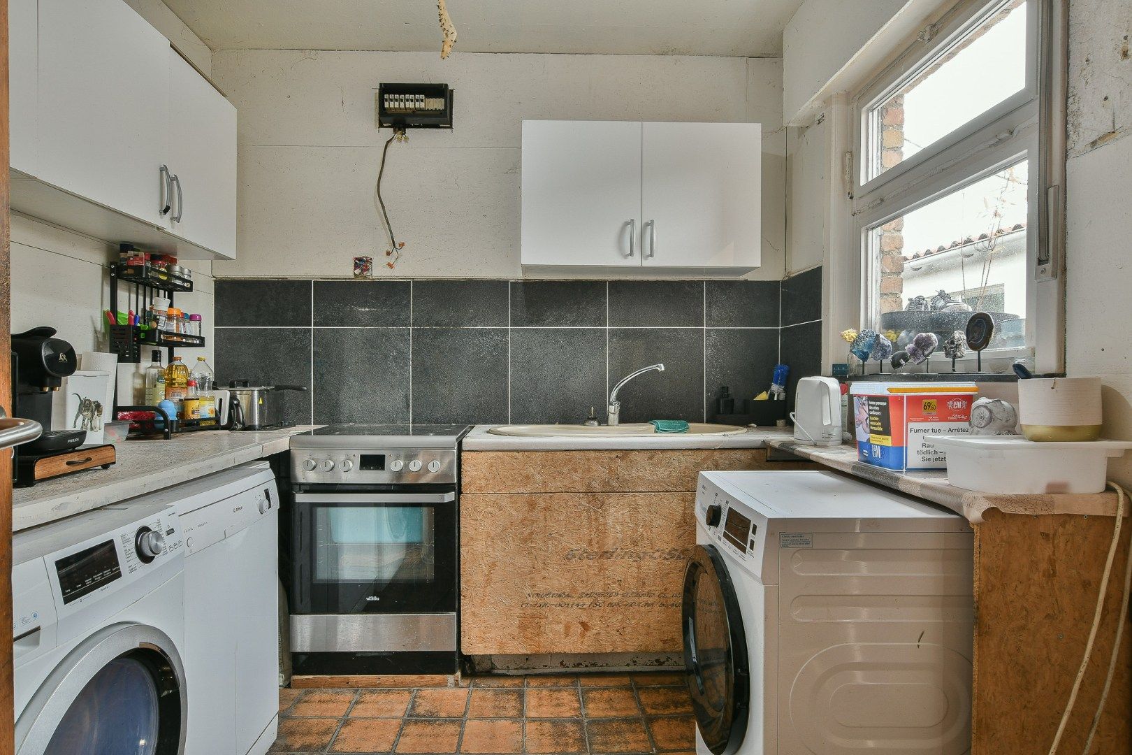 Te renoveren woning in het centrum van Veldegem foto 5