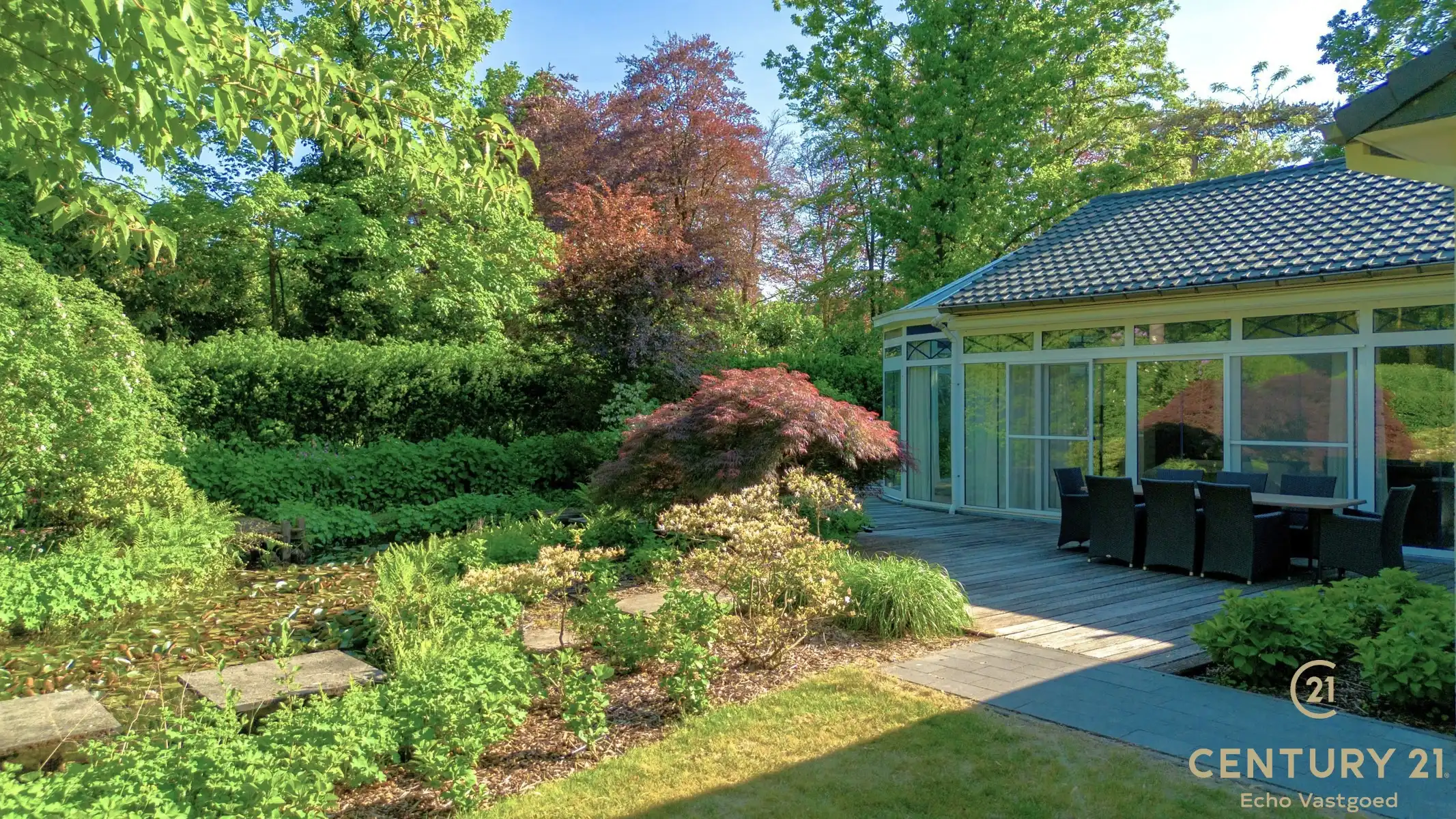 Gelijkvloerse fraaie villa met prachtige tuin op ca 1700m² foto 10