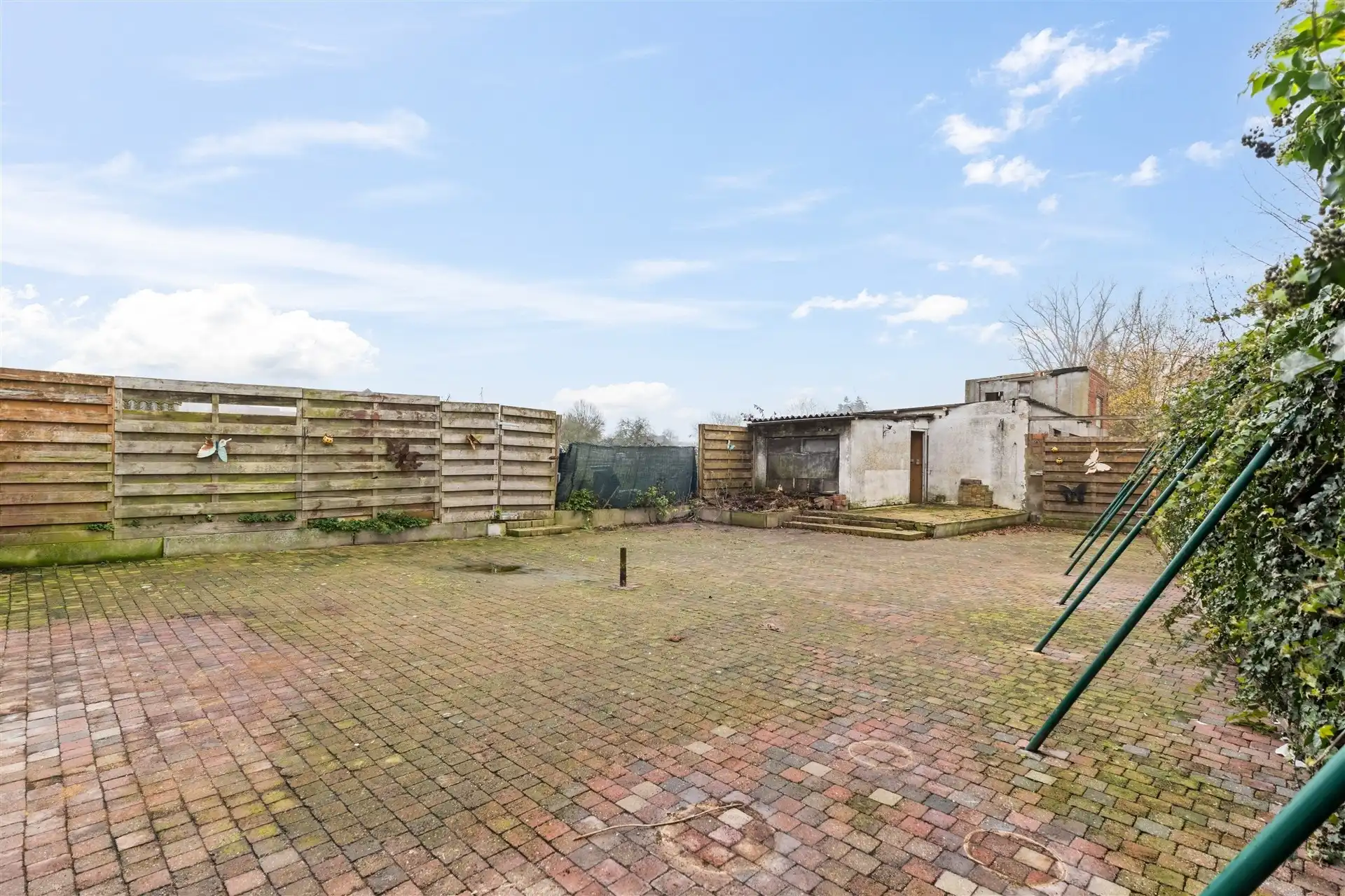 Te renoveren half open bebouwing met garage op centrale ligging te Oudegem foto 16