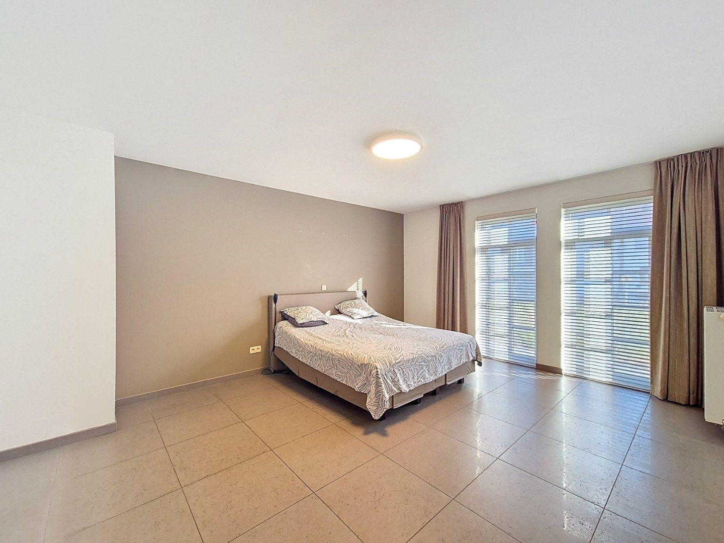 Gelijkvloersappartement met 2 slaapkamers en 2 autostandplaatsen foto 11