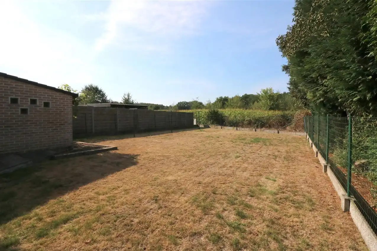 Gusting gelegen woning met 3 slp, garage en tuin foto 27