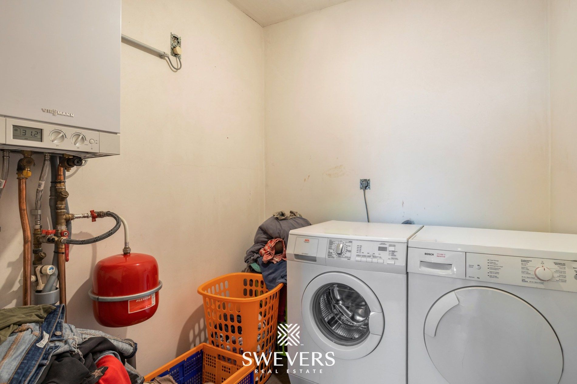 Ruime, instapklare woning met drie slaapkamers en prachtige tuin foto 11