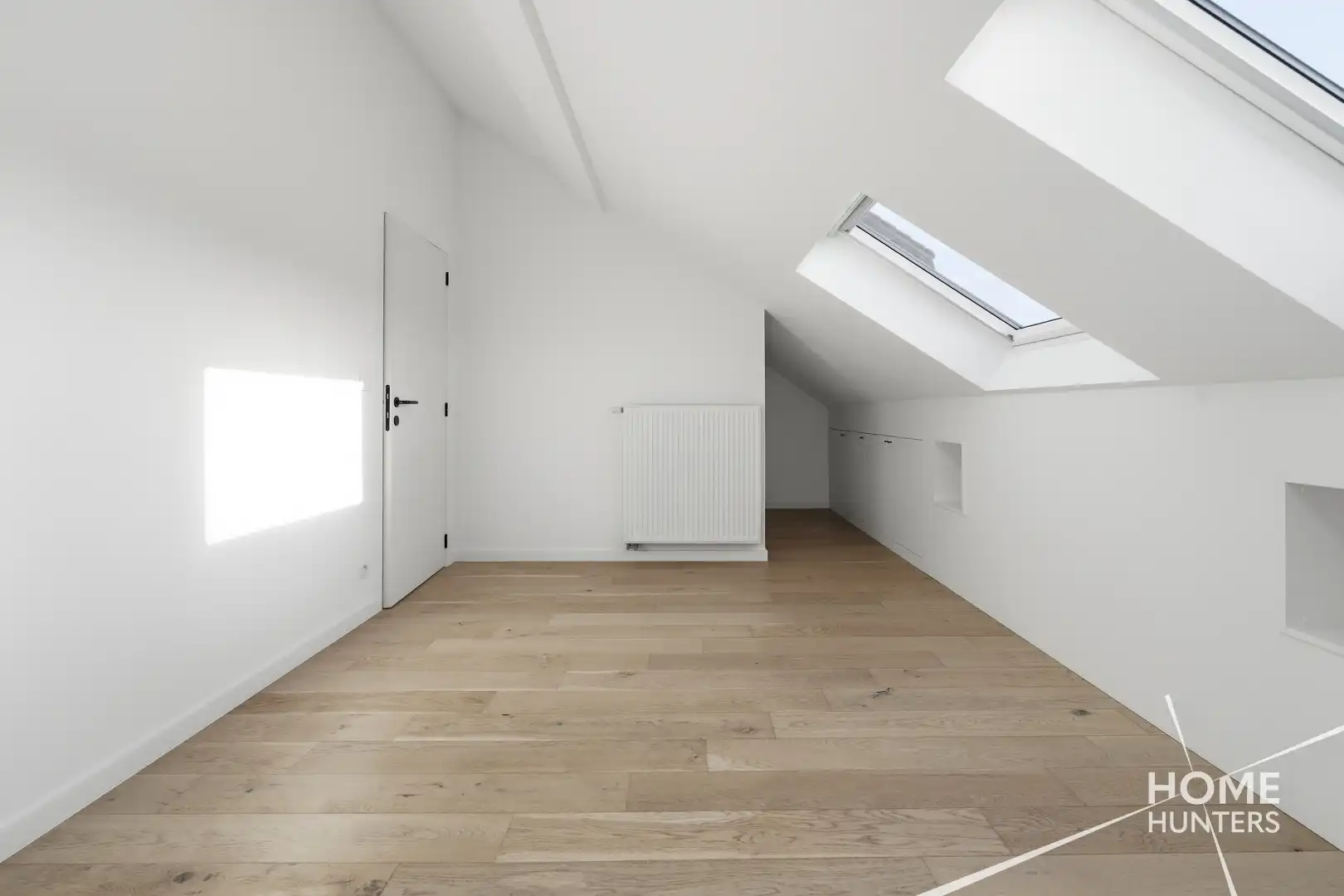 Ruim dakappartement met royaal terras en een schitterend uitzicht over Ieper foto 11