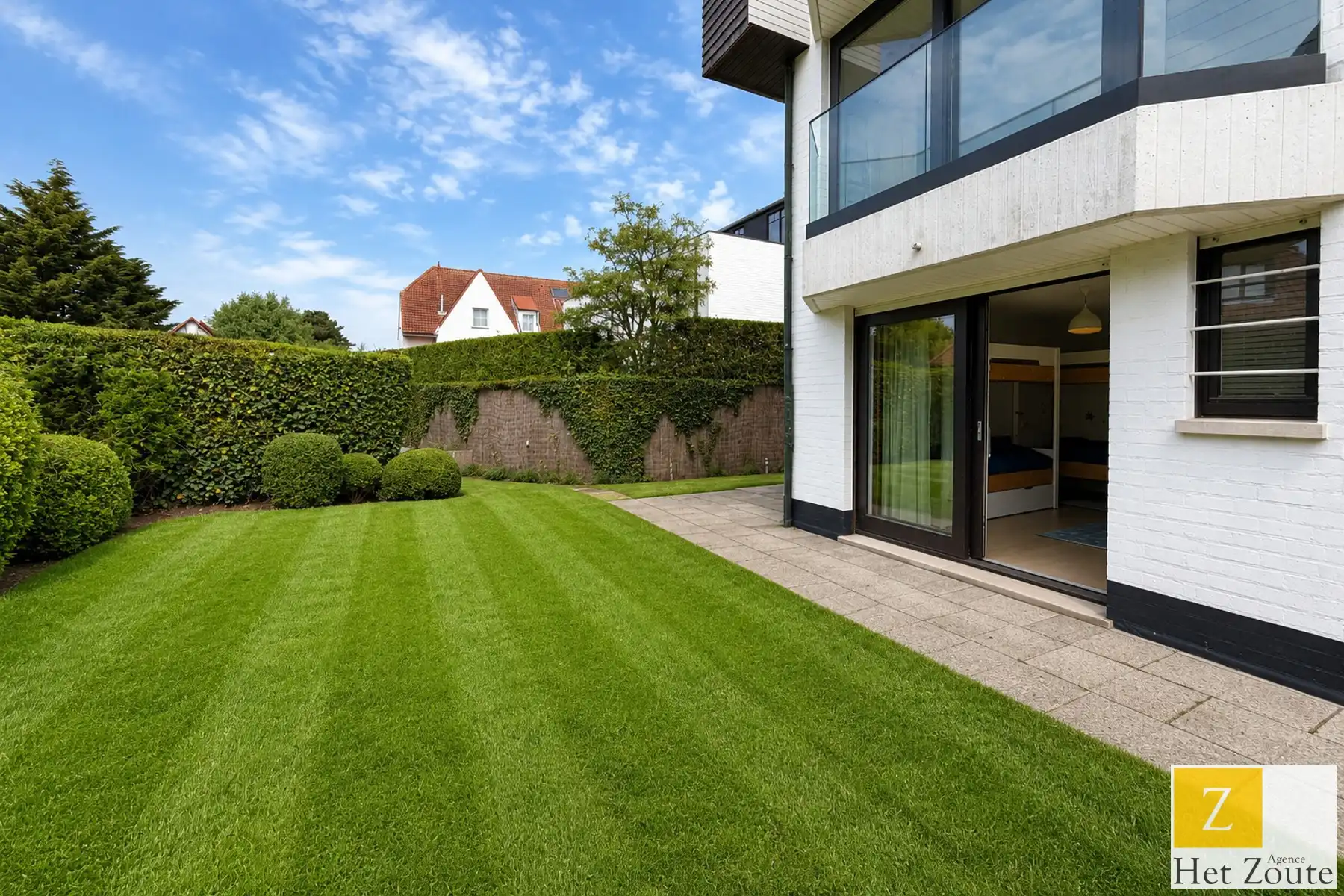 Hoekappartement met uitzonderlijke tuin op topligging foto 2