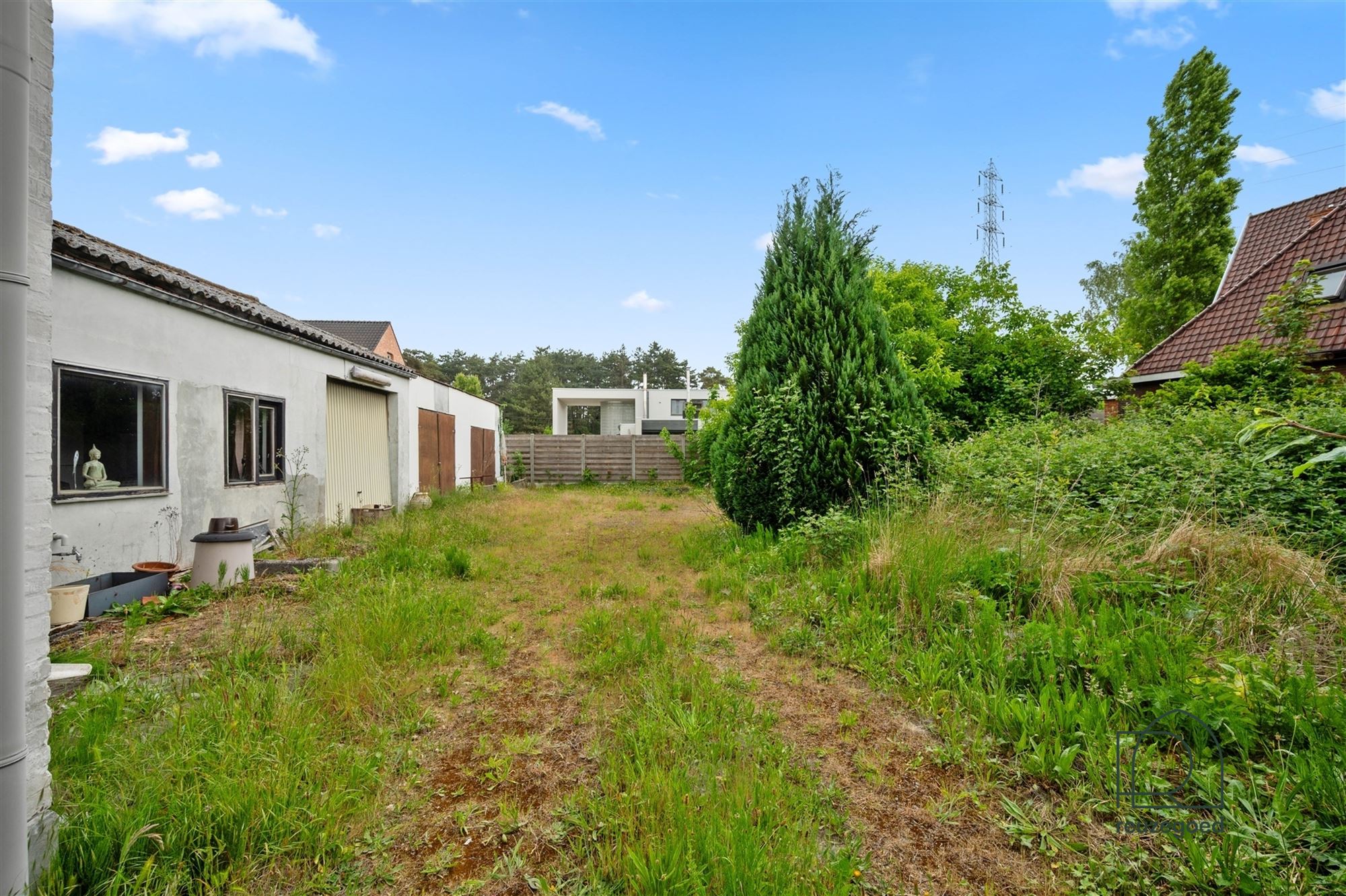 Te renoveren huis (tweewoonst)  met mogelijkheid tot 2 bouwgronden foto 35