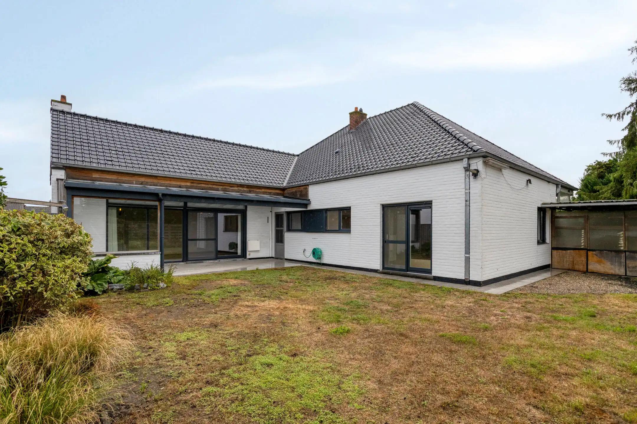 Open bebouwing met twee garages en ruime zolder foto 28
