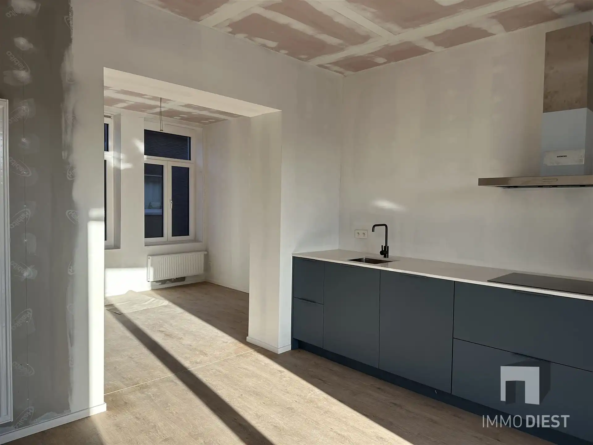 Opbrengsteigendom - 3 gloednieuwe appartementen + 1 handelspand foto 17