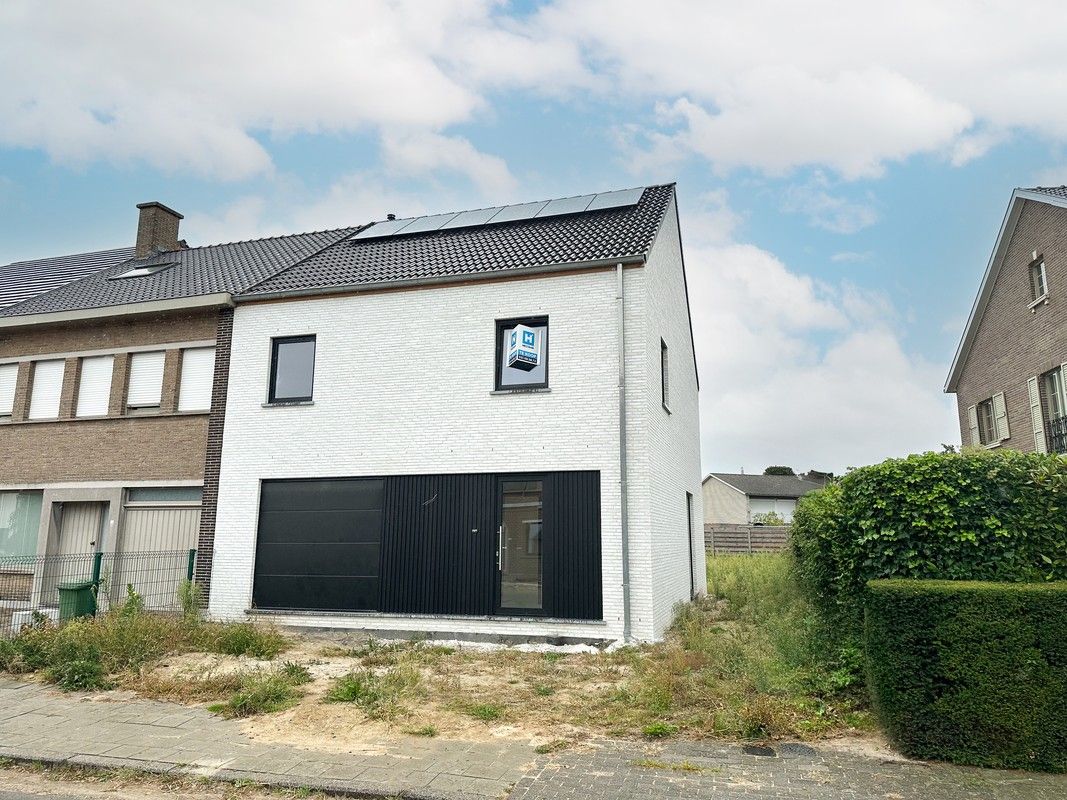 Moderne nieuwbouwwoning te koop Melle foto {{pictureIndex}}