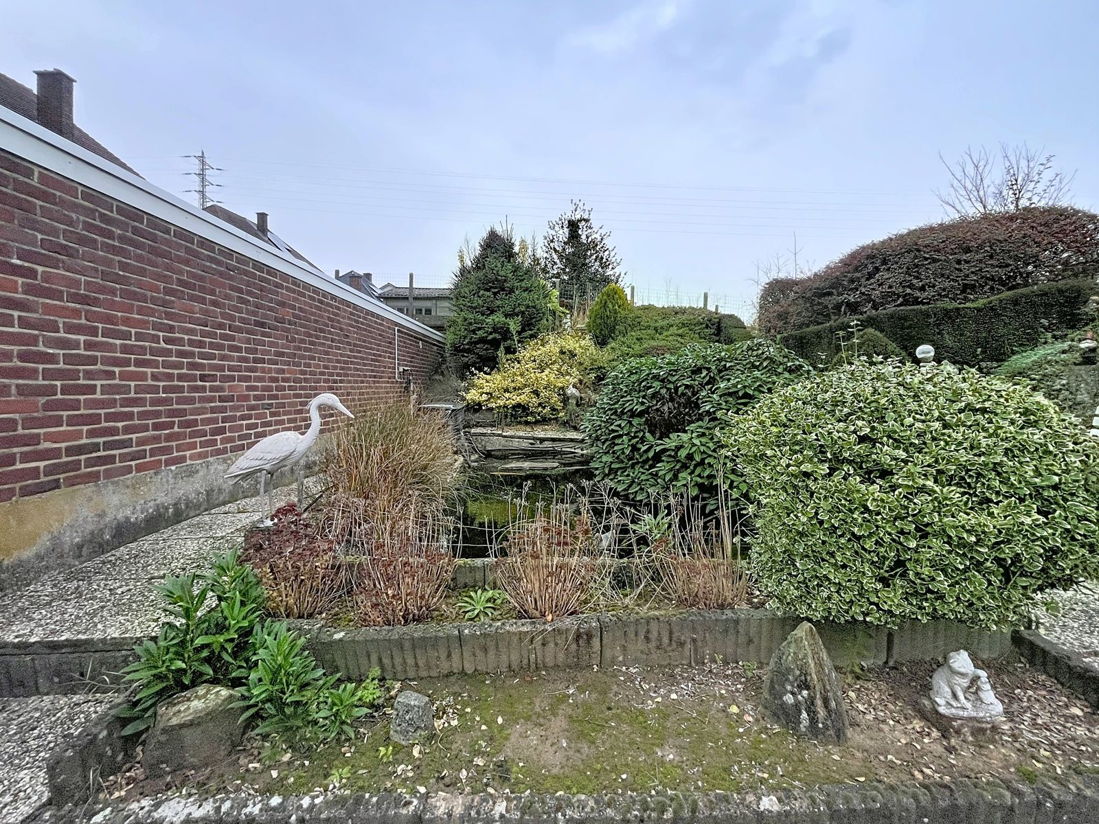 Gelijklvloers app met 2 slpks - garage en gemeenschap tuin foto 11