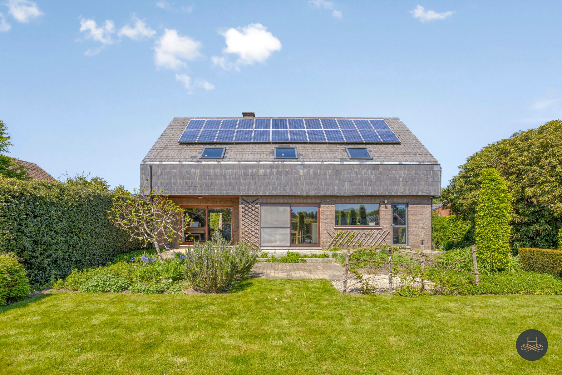Vrijstaande woning met prachtig aangelegde zuidgerichte tuin foto 25