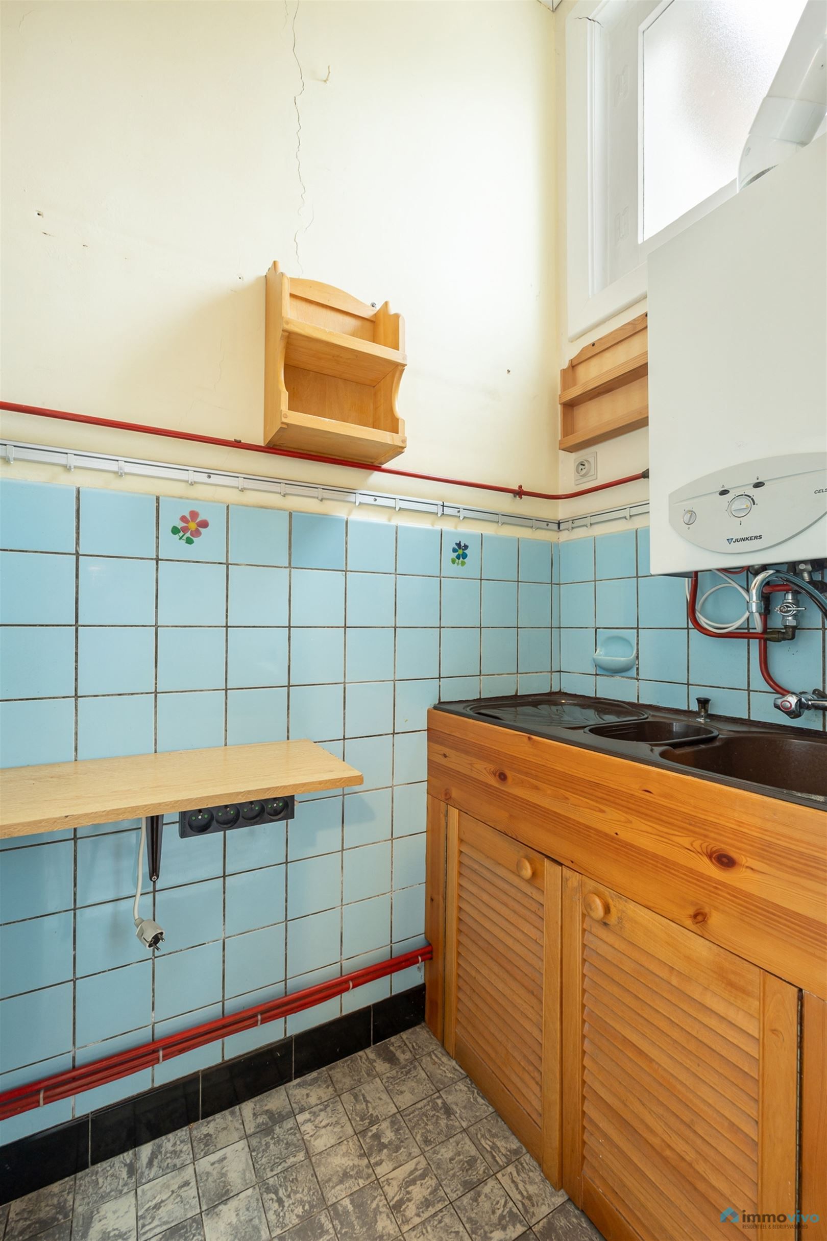 Volledig te renoveren woning met potentieel, tuin en mogelijkheid tot extra slaapkamer. foto 9