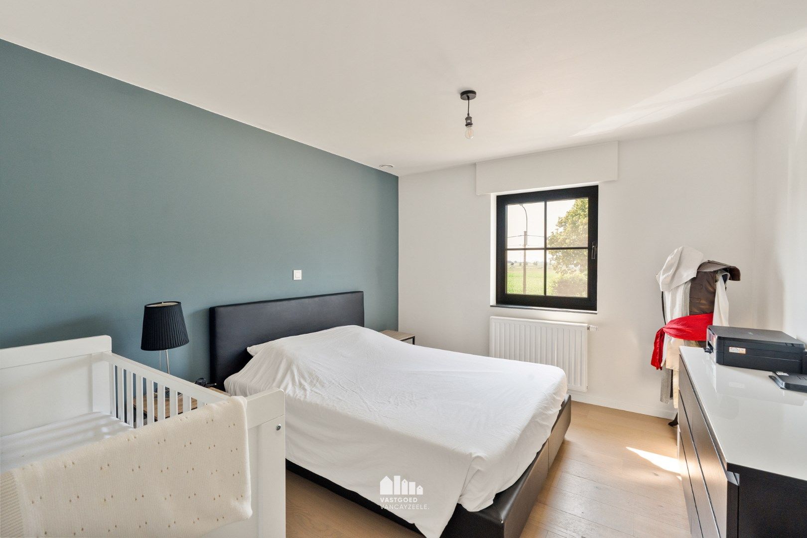 Recente kwalitatief afgewerkte woning met zonnige tuin en garage. foto 16