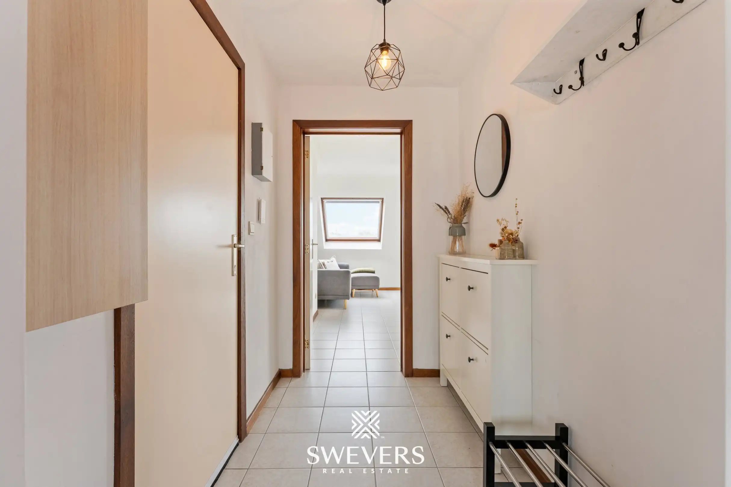 Instapklaar en lichtrijk 1-slaapkamerappartement op topligging in Houthalen centrum foto 14