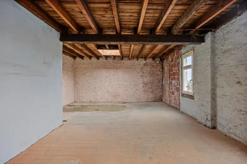Pand met authentieke gevel op toplocatie – 355 m² renovatiepotentieel foto 8