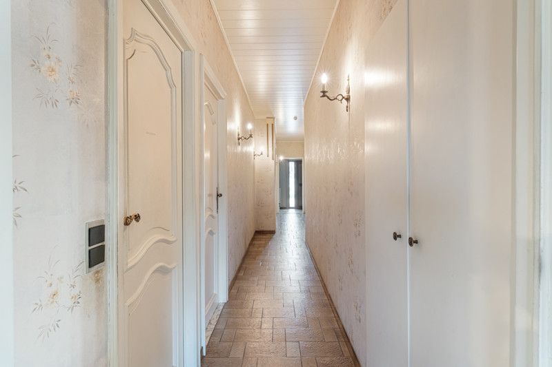 Gelijkvloerse woning met grote loods achteraan op 25are foto 8