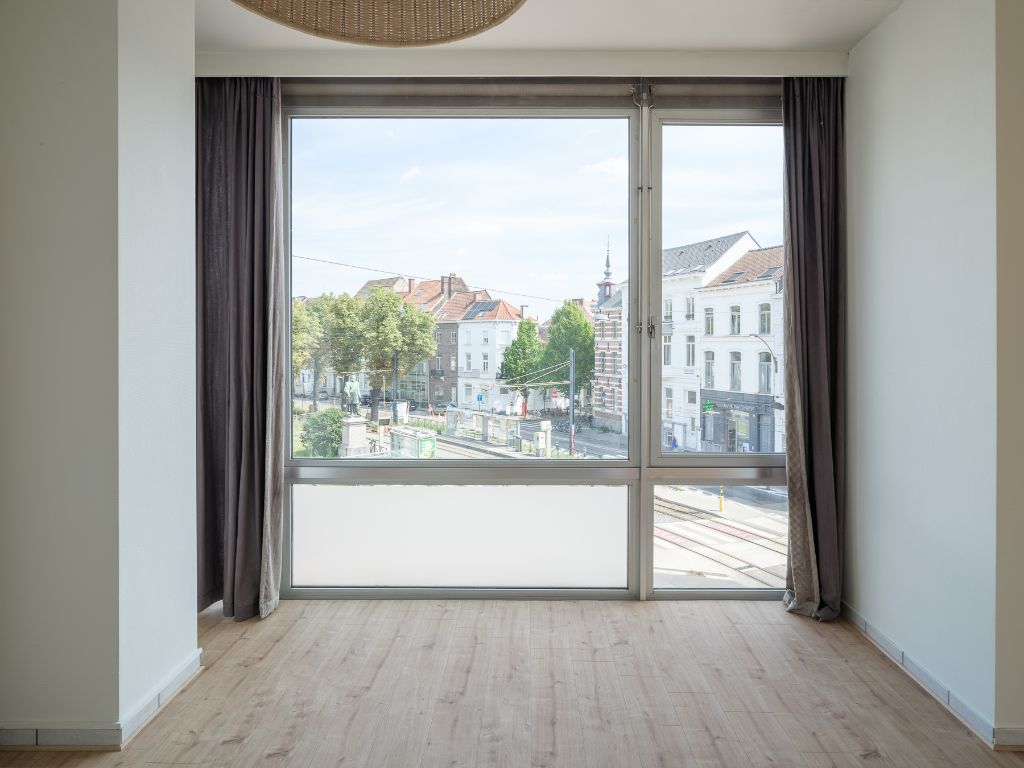 Unieke, lichtrijke cityflat nabij de Coupure foto 6