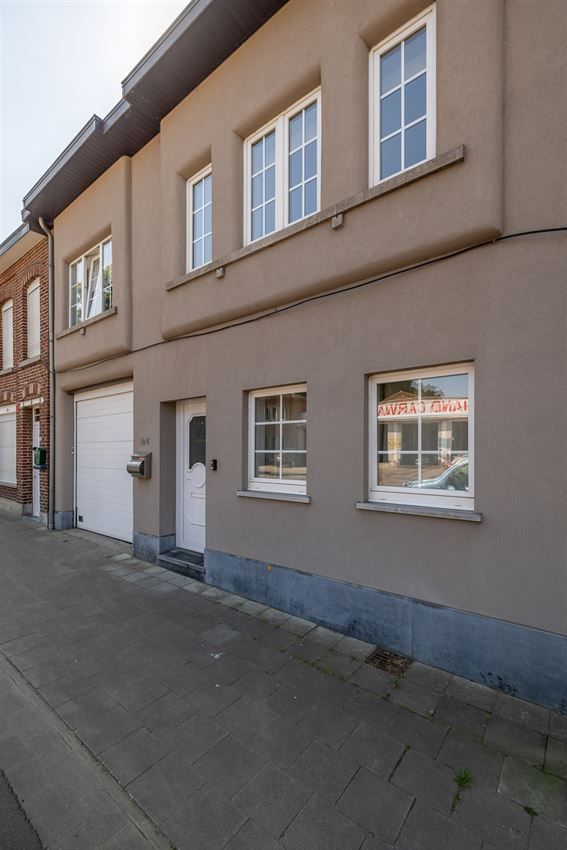 Stadswoning met 3 slpk., tuin en garage foto {{pictureIndex}}