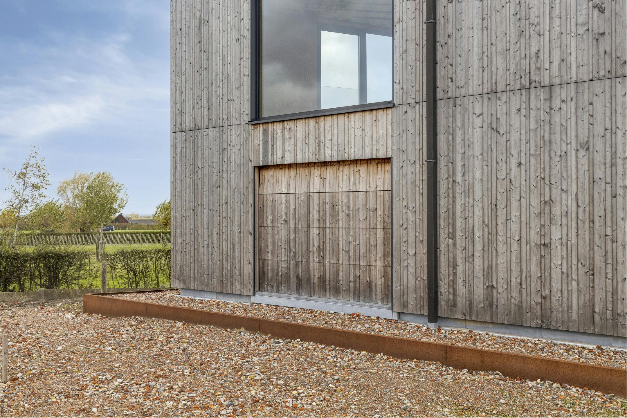 Moderne houtskeletwoning met panoramisch uitzicht foto 29