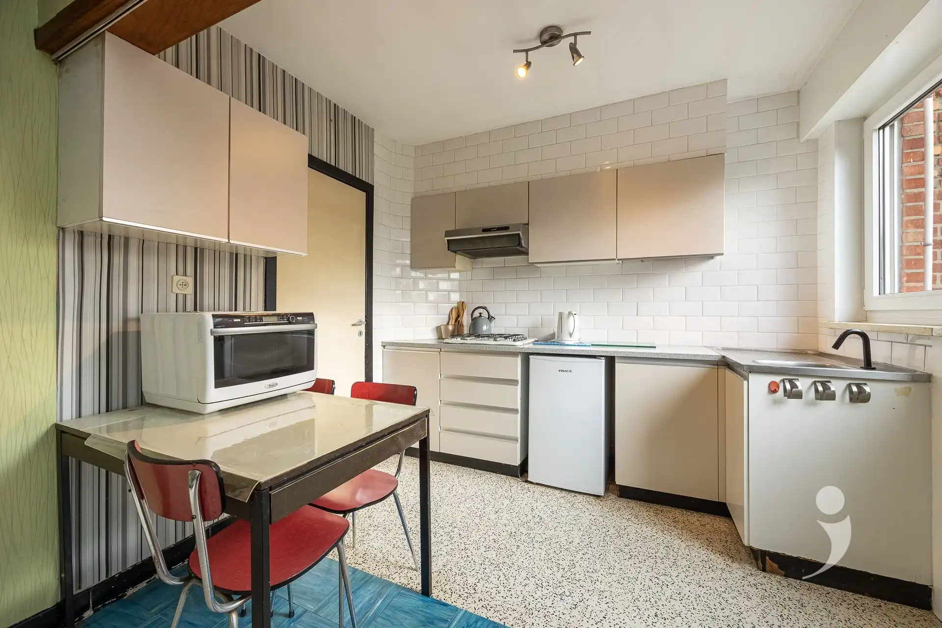 Te renoveren woning met oprit en tuin in Herent foto 7