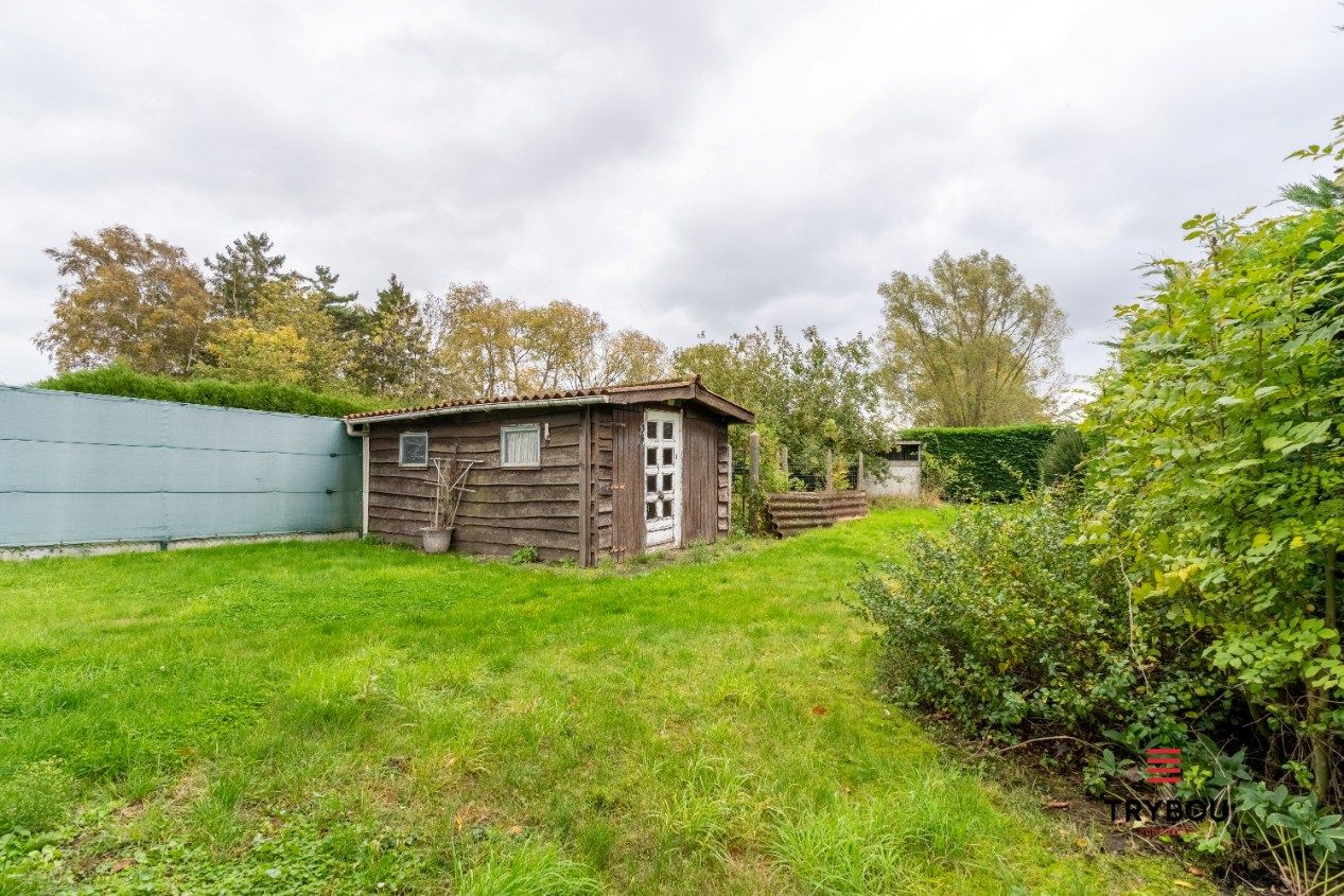 Gelijkvloerswoning met verzorgde tuin op ruim perceel van 860m² foto 23