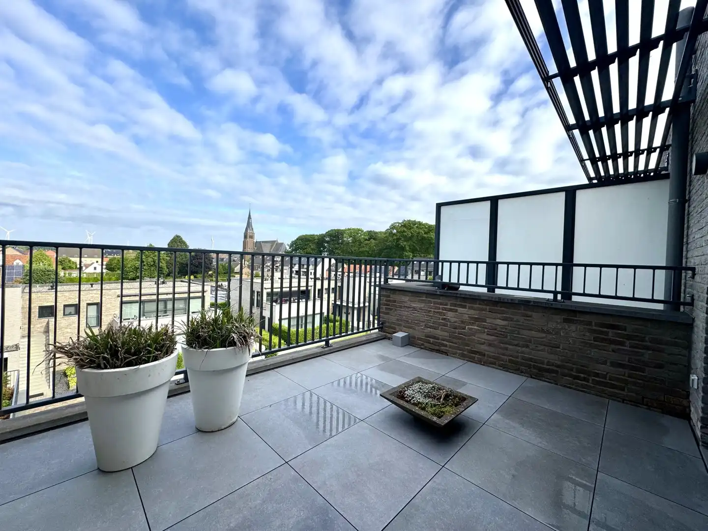Nieuwbouwappartement met 2 slaapkamers én 2 terrassen te huur in Dilsen foto 12