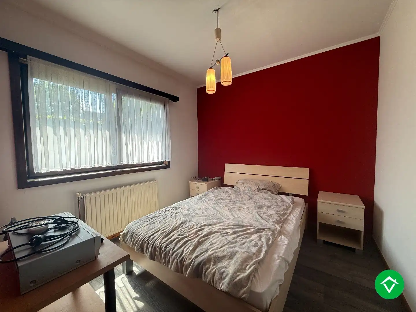 Rustig gelegen gelijkvloerse halfopen woning met 2 slpk's + dubbele garage foto 10