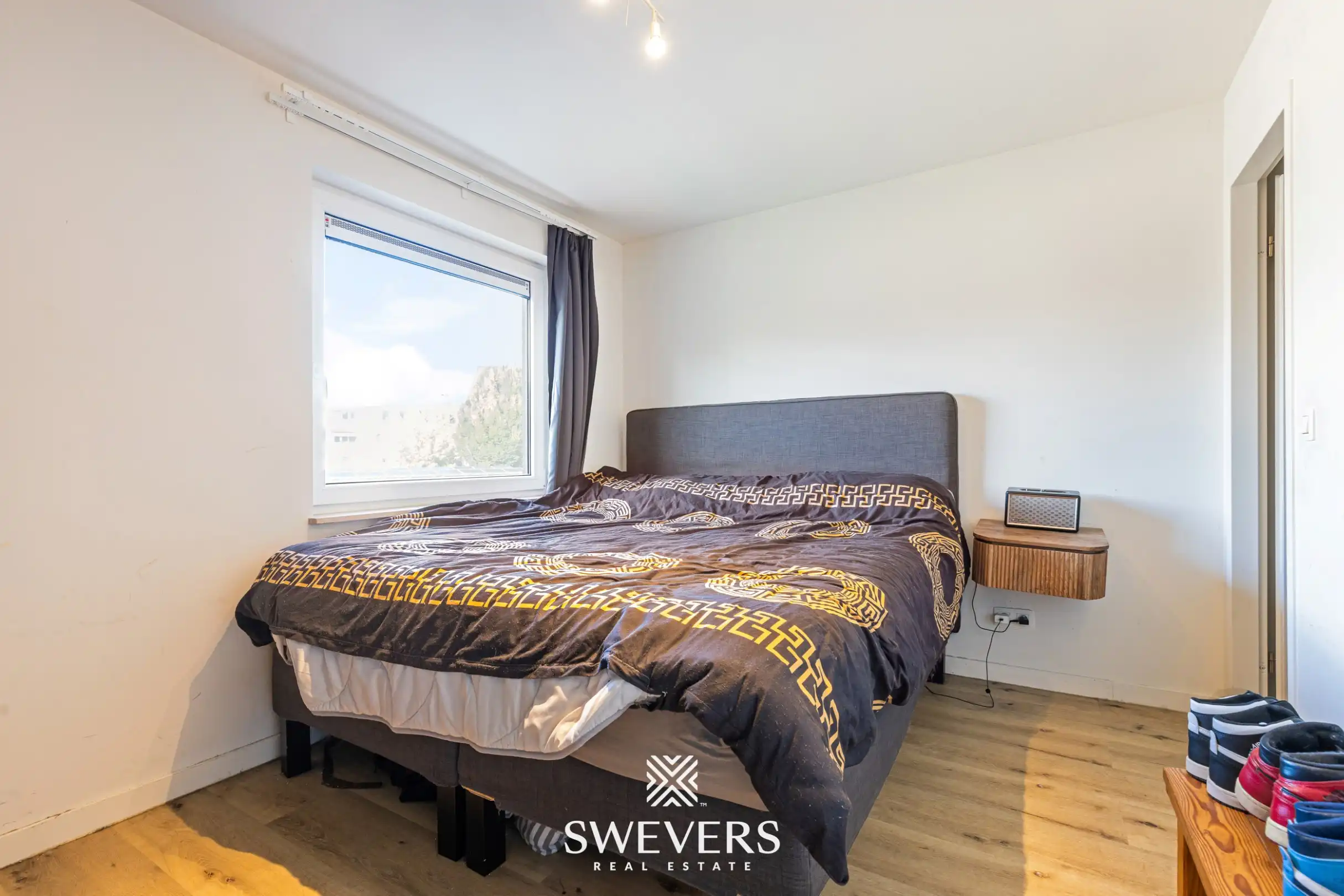 Uitstekend gelegen en volledig gerenoveerd appartement met staanplaats foto 13
