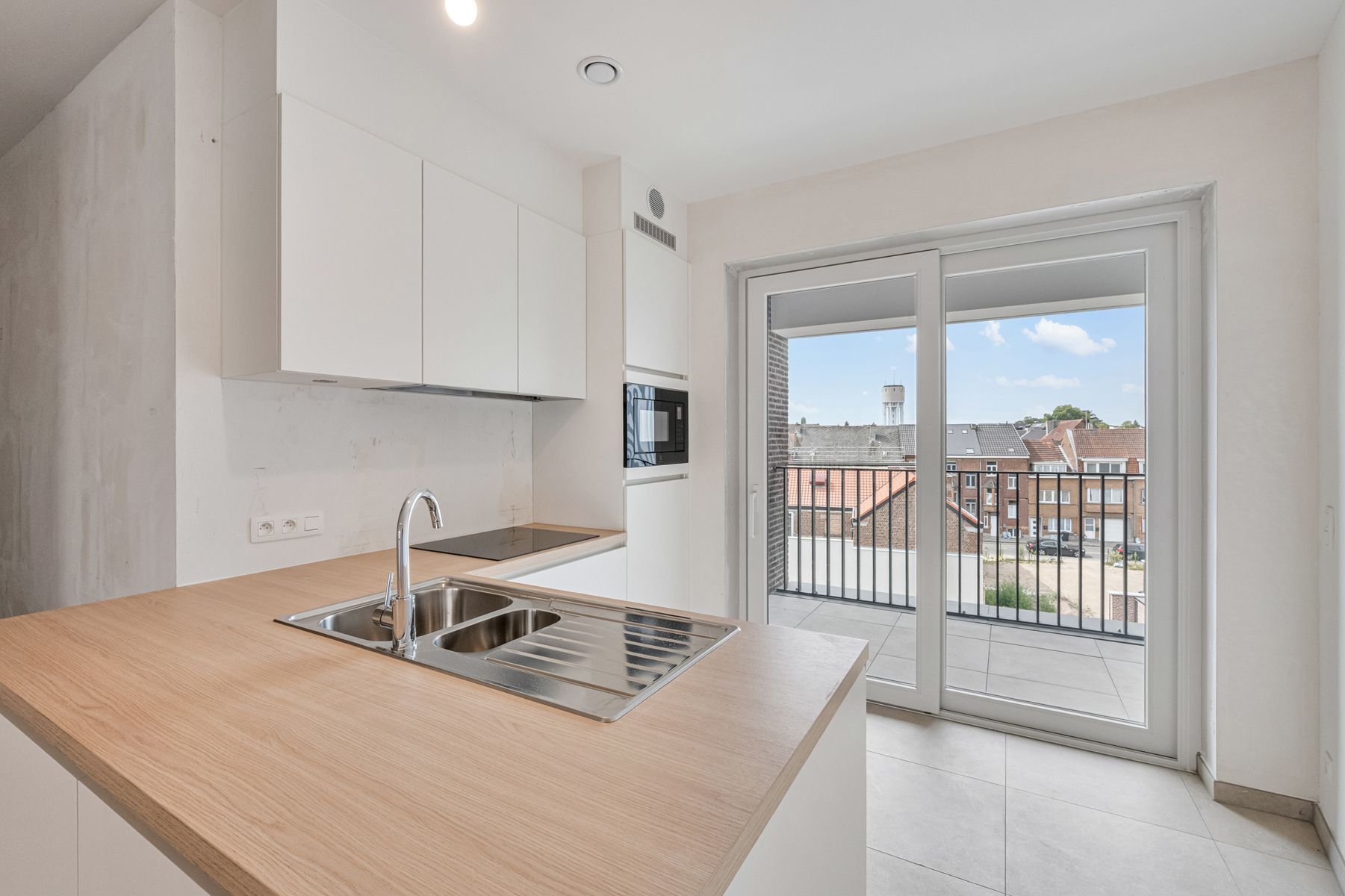 Nieuwbouwappartement met 2 slpks + terras foto 3