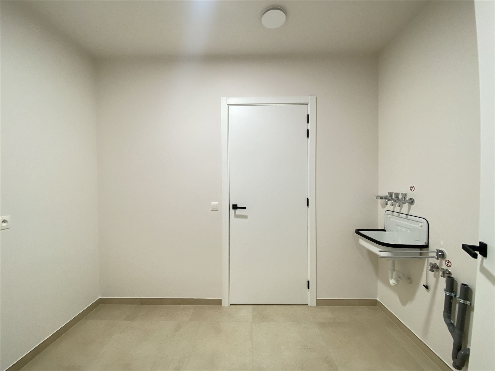 Nieuwbouwwoning te Kluizen met optimale ruimteverdeling en hedendaagse afwerking foto 11