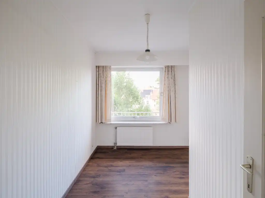 Op te frissen drieslaapkamerappartement met open zicht over het Citadelpark. foto 13